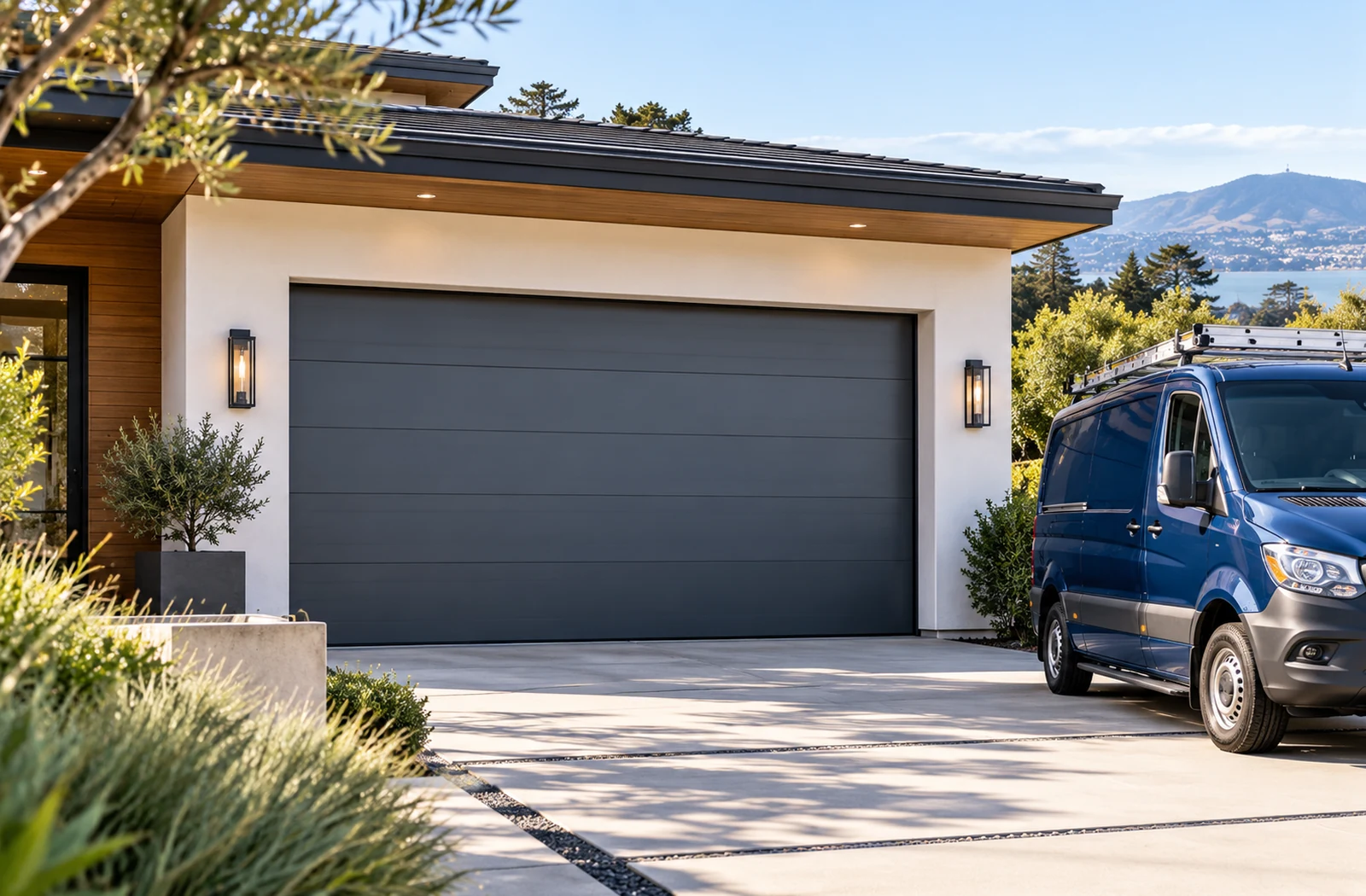 Modern home with garage door and Daniel Garage Door Repair service van in Millbrae, California
